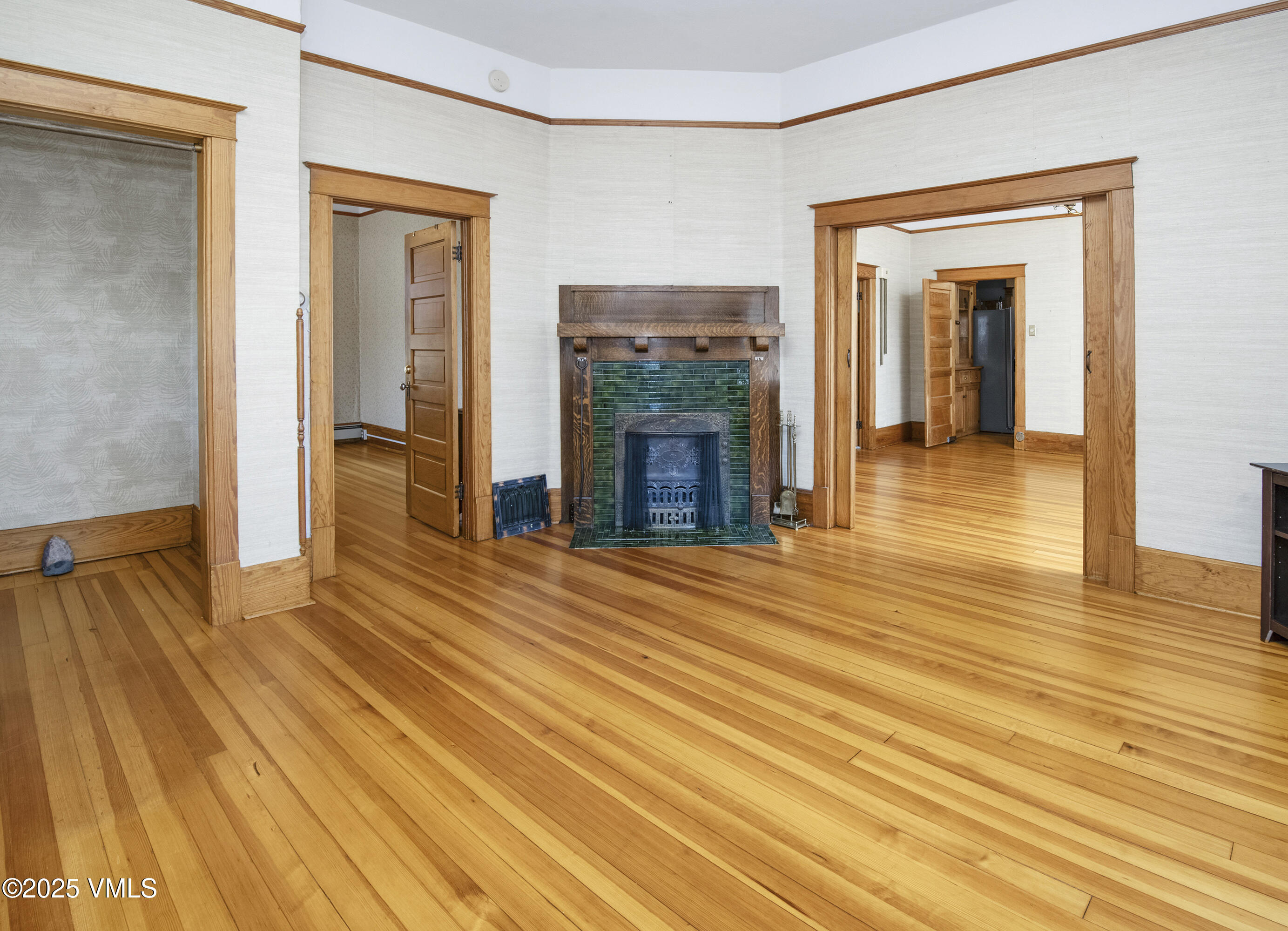 409 Washington Street Eagle, CO 81631 - Photo 5 of 28 wooden floor and windows in a room