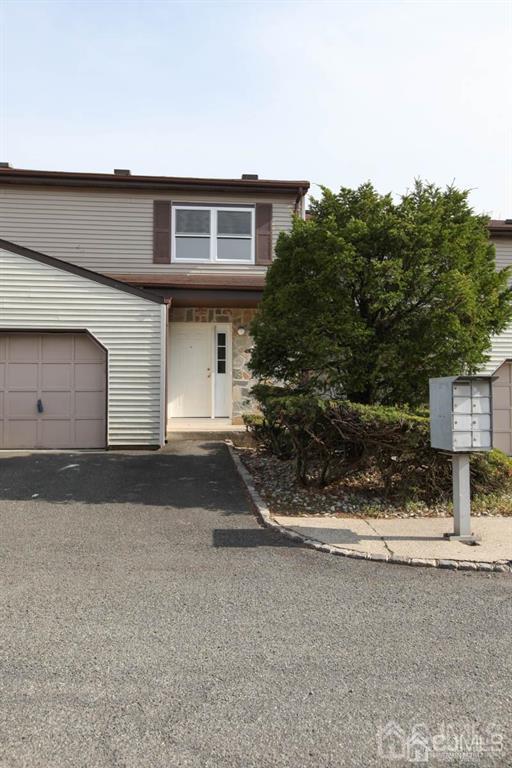 3004 Hana Road Edison, NJ 08817 - Photo 1 of 14 a front view of house with yard