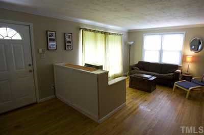 2260 Rumson Road Raleigh, NC 27610 - Photo 2 of 12 a living room with furniture and a window