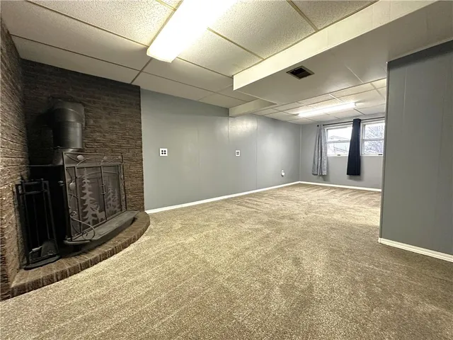 a bathroom with a sink toilet and mirror