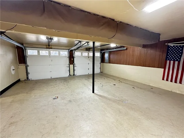 a huge green field with lots of trees