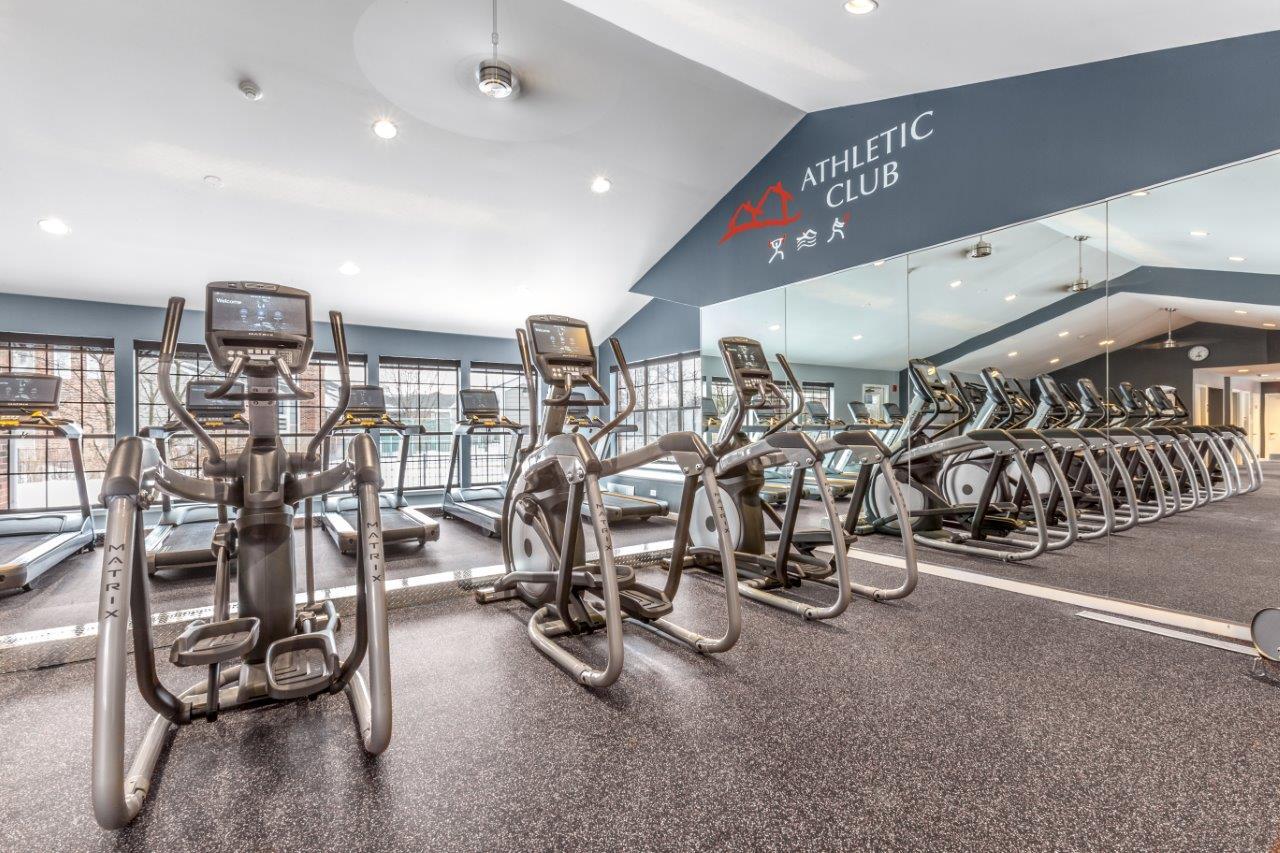 167 Ascot Lane, Unit 3413 Willowbrook, IL 60527 - Photo 22 of 29 a view of a room with gym equipment