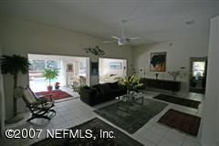 3333 Kings Road South St. Augustine, FL 32086 - Photo 8 of 11 a view of a livingroom with furniture and hardwood floor