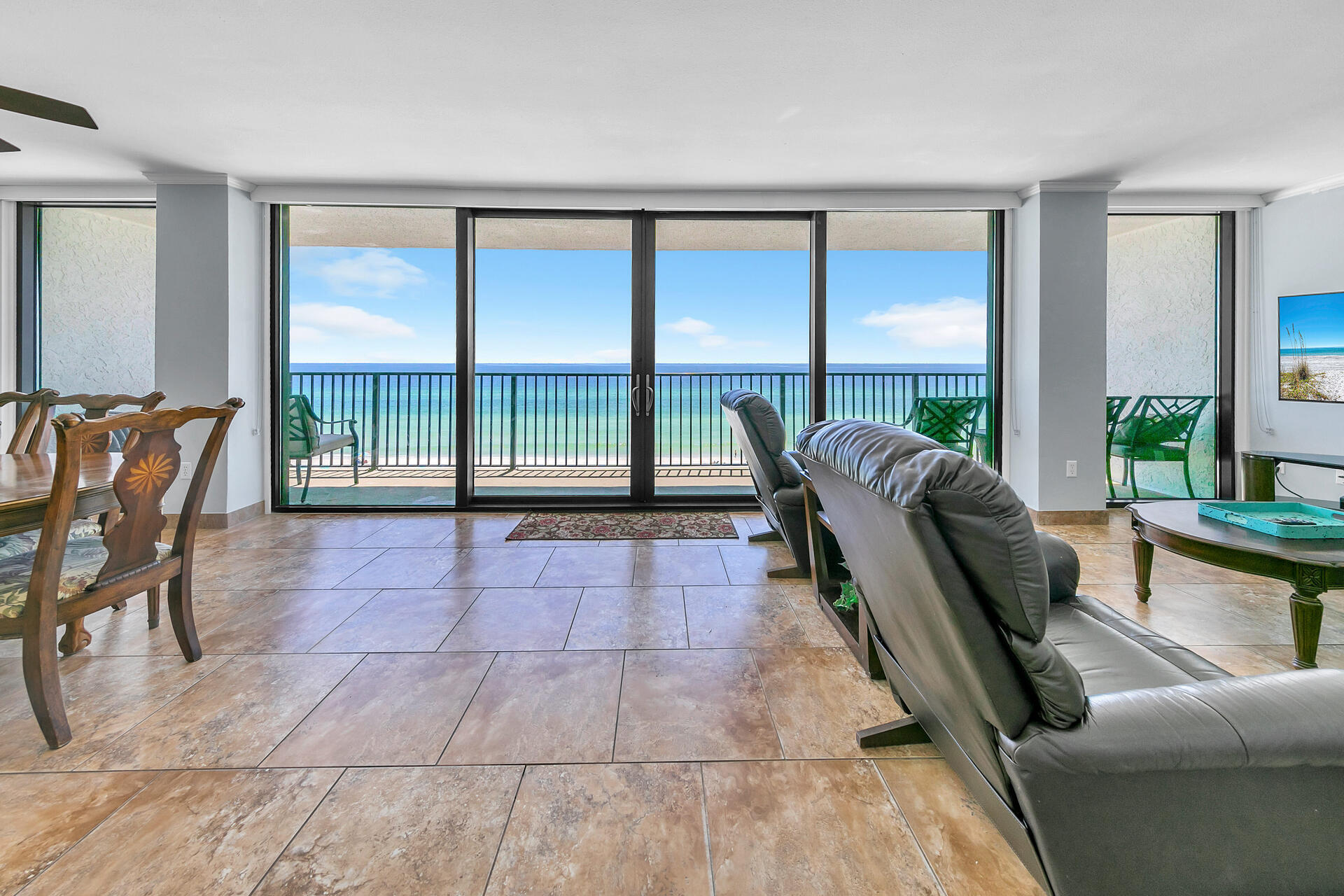 17351 Front Beach Road, Unit W602 Panama City Beach, FL 32413 - Photo 5 of 30 a living room with furniture and a floor to ceiling window