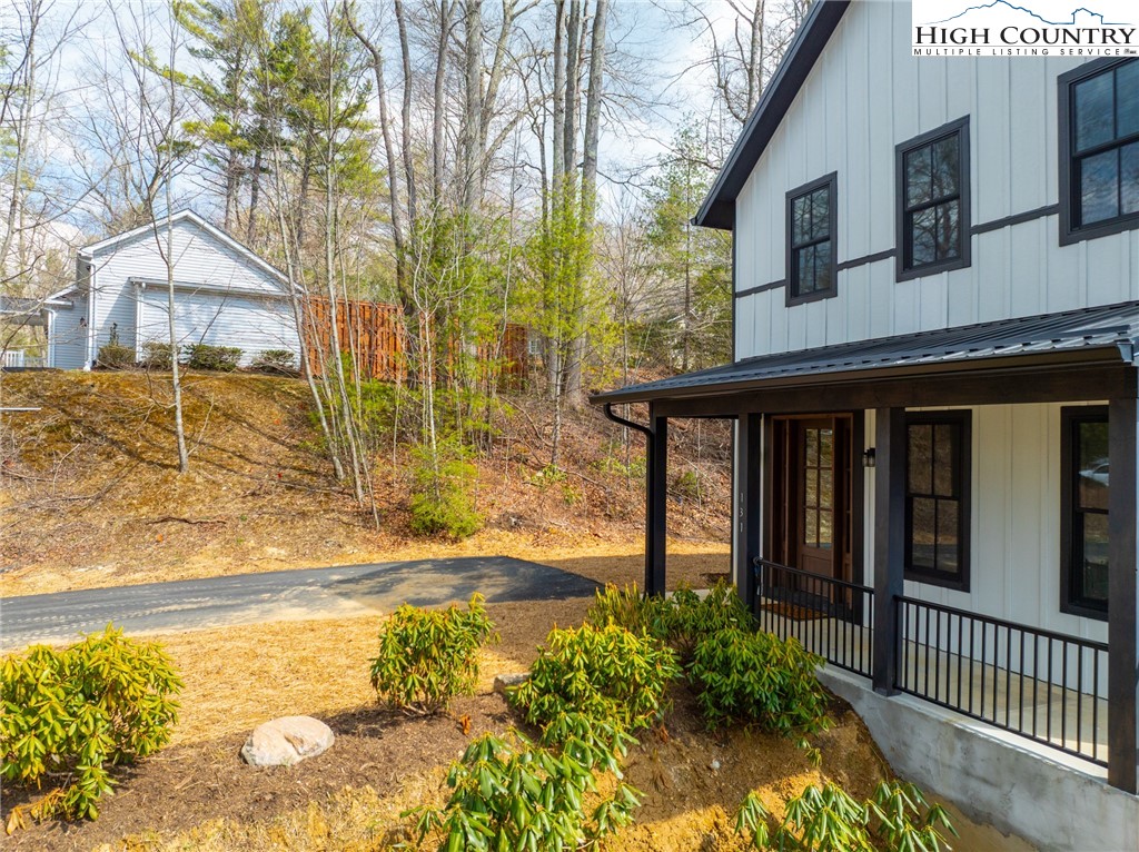 131 Bryce Way Boone, NC 28607 - Photo 29 of 38 a front view of a house with a yard