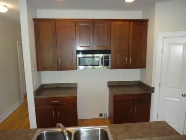 149 Mandy Circle Santa Rosa Beach, FL 32459 - Photo 5 of 13 a kitchen with a sink and cabinets