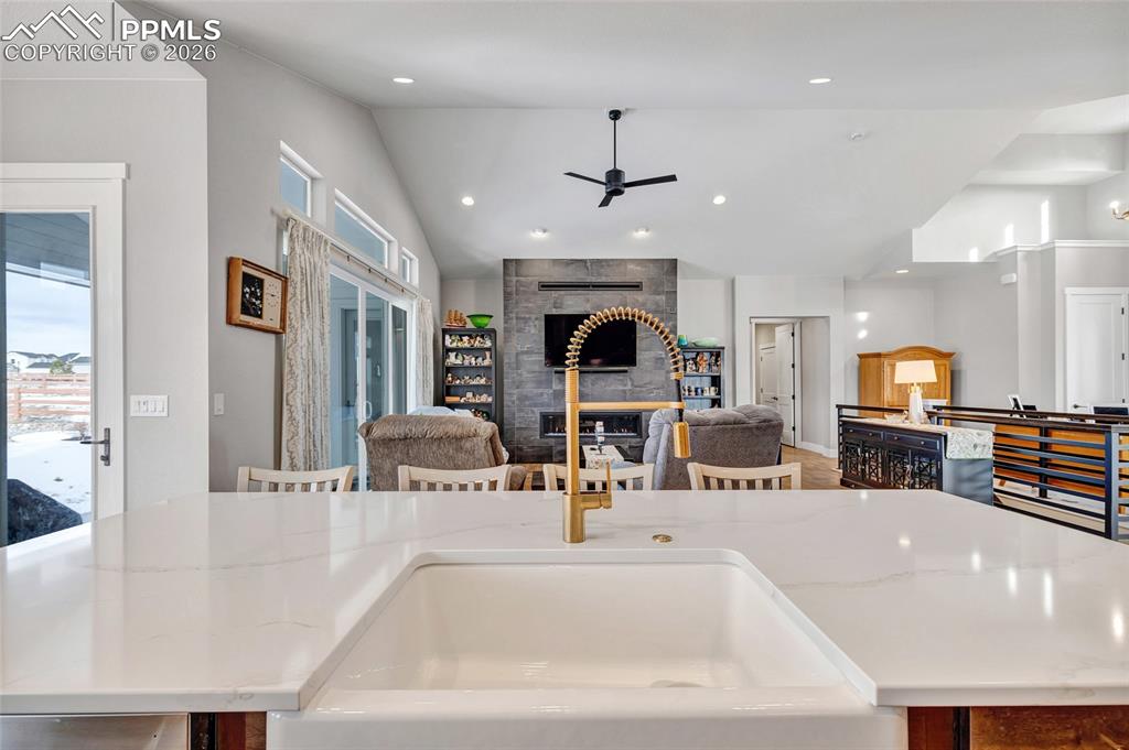 2402 Parma Court Colorado Springs, CO 80921 - Photo 16 of 45 a kitchen with stainless steel appliances a sink and a refrigerator