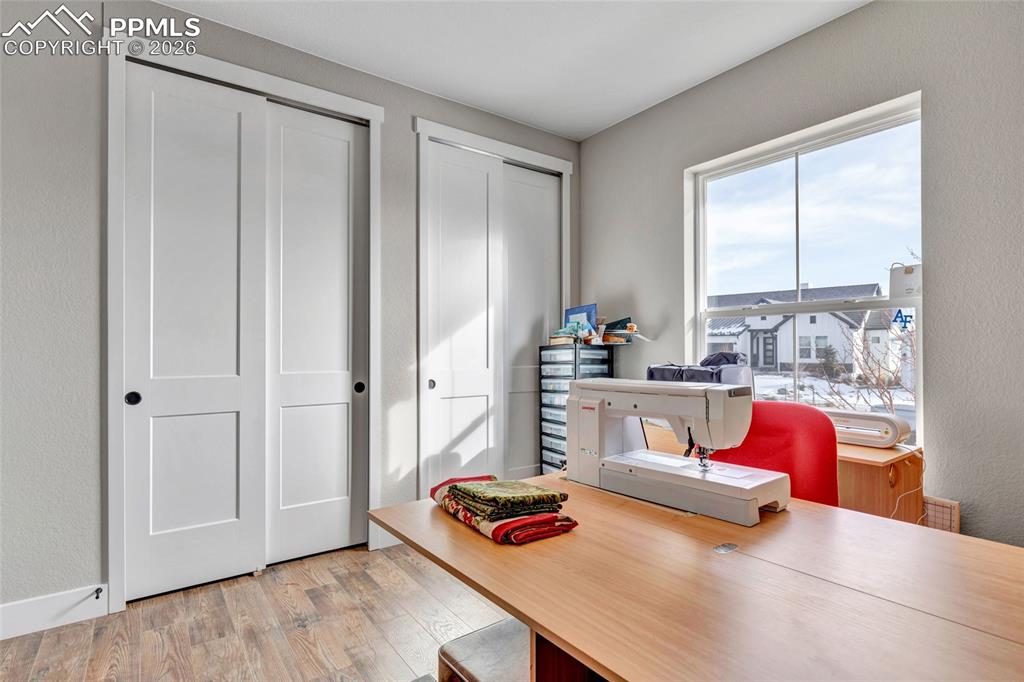 2402 Parma Court Colorado Springs, CO 80921 - Photo 22 of 45 a living room with furniture and a window