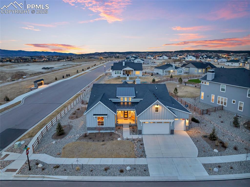 2402 Parma Court Colorado Springs, CO 80921 - Photo 3 of 45 an aerial view of a house with a yard and large tree
