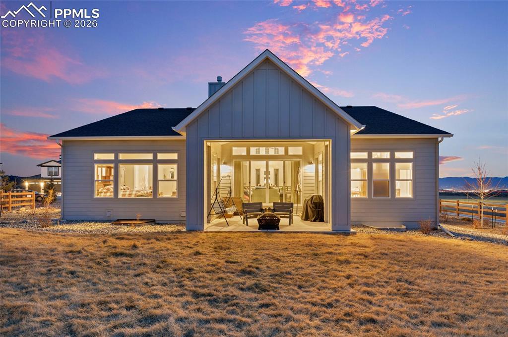 2402 Parma Court Colorado Springs, CO 80921 - Photo 42 of 45 a view of a house with a yard