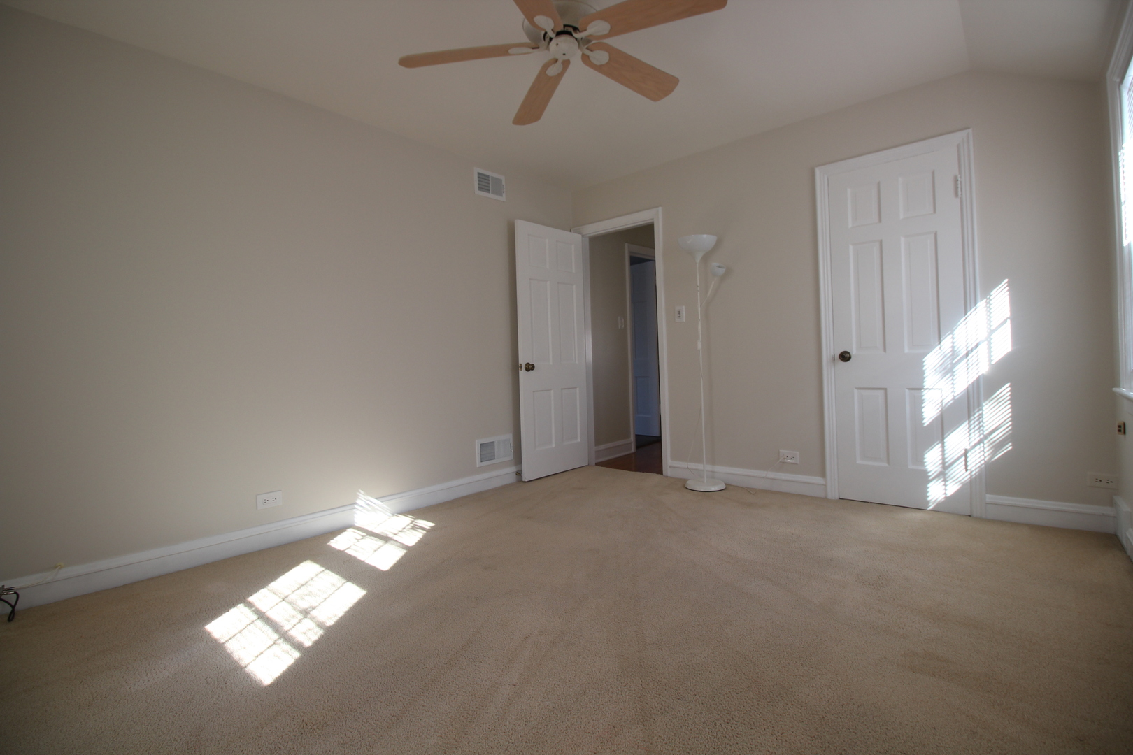 5237 North Olcott Avenue Chicago, IL 60656 - Photo 11 of 26 a view of empty room with window and ceiling fan