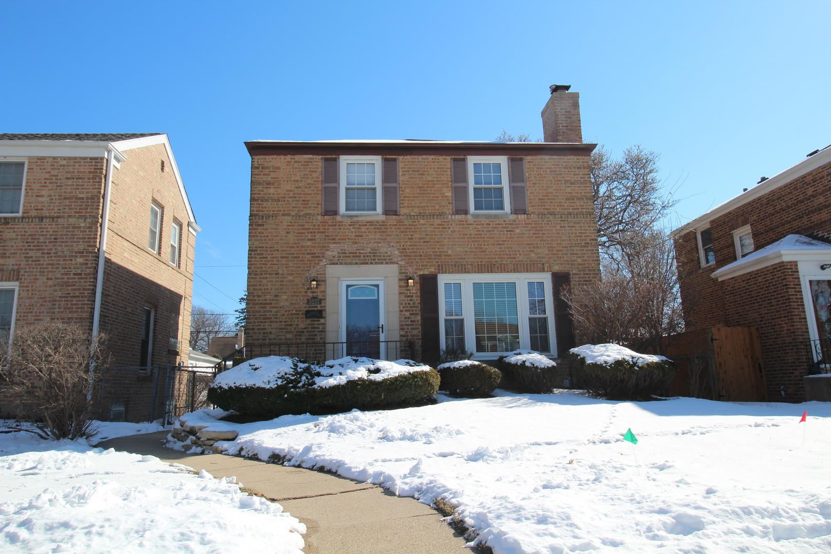 5237 North Olcott Avenue Chicago, IL 60656 - Photo 26 of 26 a view of a house with snow on the roof