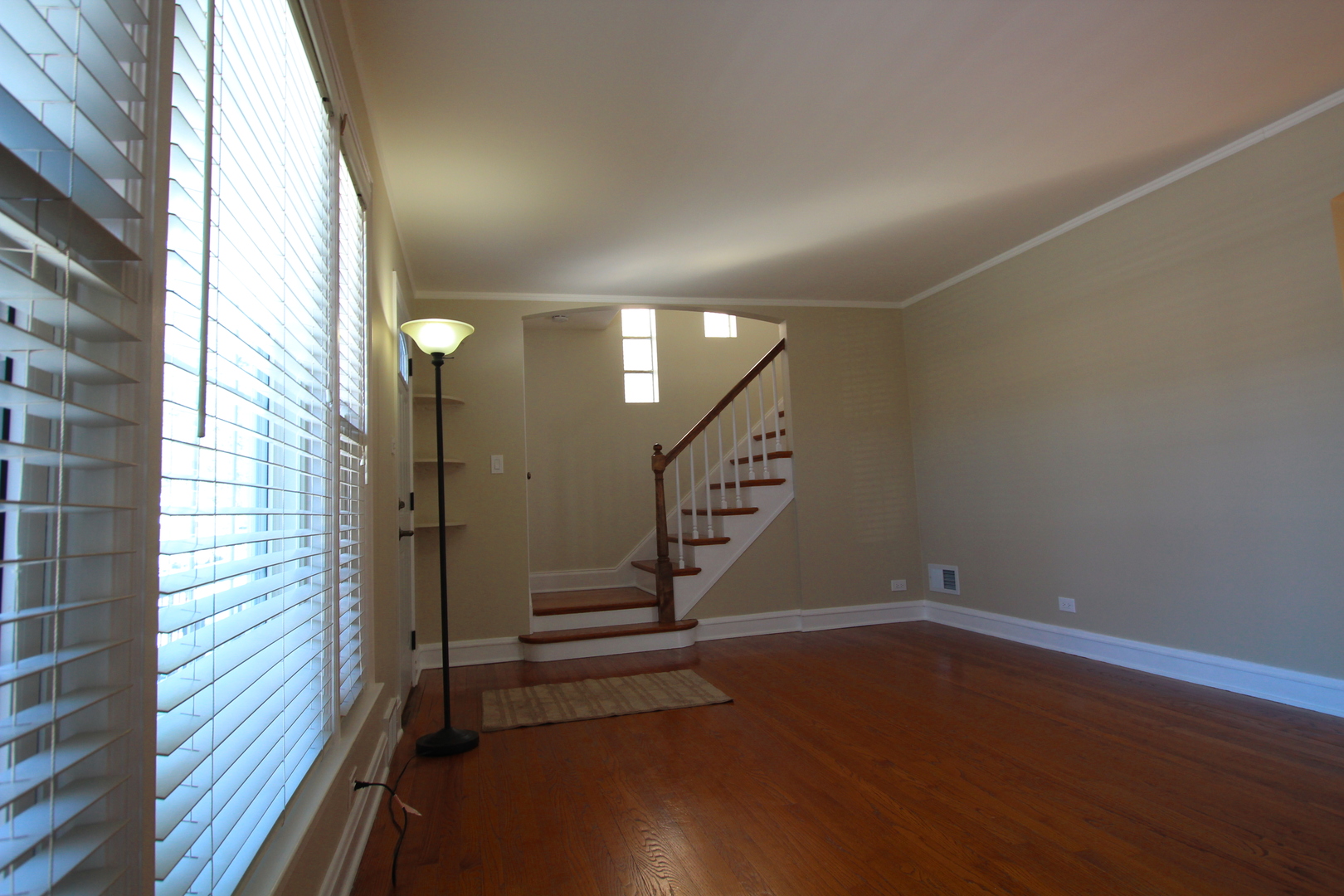 5237 North Olcott Avenue Chicago, IL 60656 - Photo 4 of 26 a view of entryway with stairs and wooden floor
