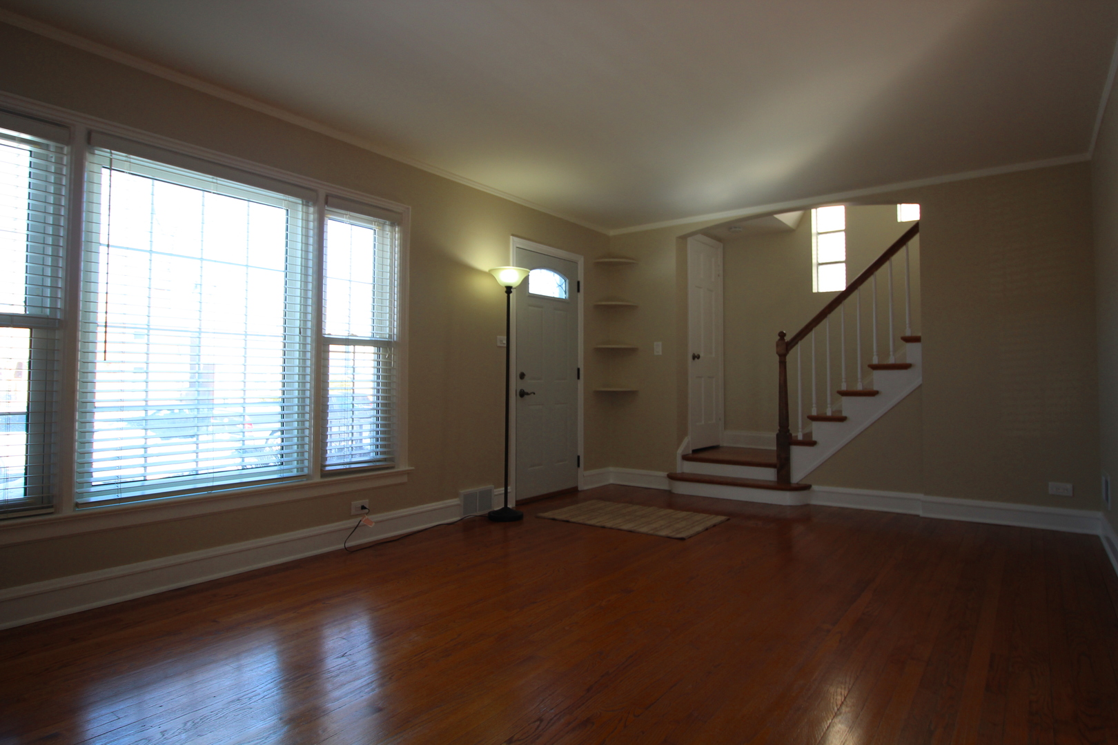 5237 North Olcott Avenue Chicago, IL 60656 - Photo 5 of 26 a view of empty room with wooden floor and fan