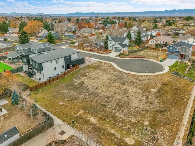 a view of a city with an ocean view