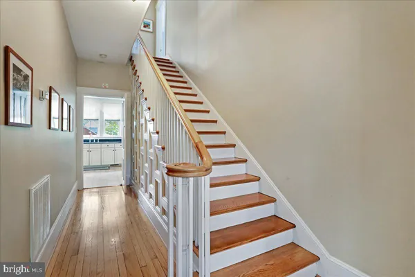a bedroom with a bed and dresser