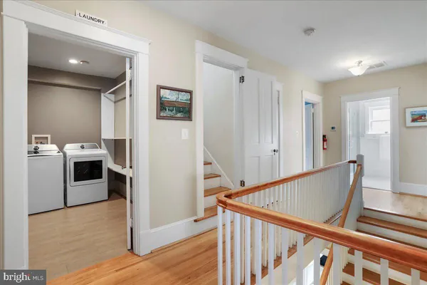 a view of a room with white walls