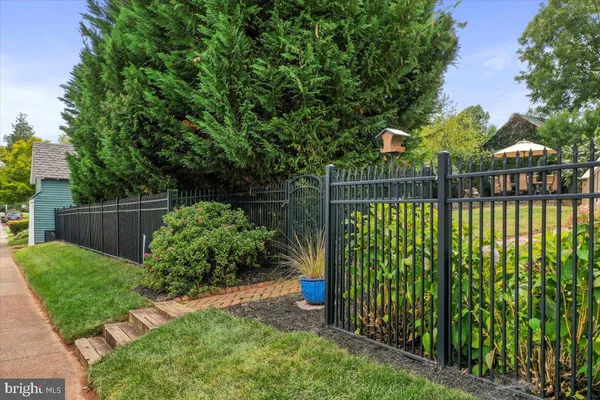 a city street lined with buildings and cars