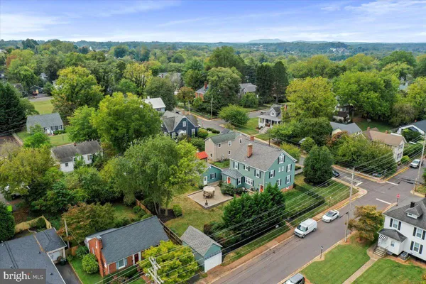 a view of a porch with wooden floor