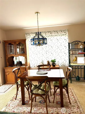 a large bathroom with a sink a mirror and a shower