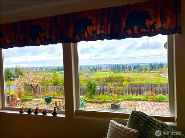 a view of a city skyline from a balcony