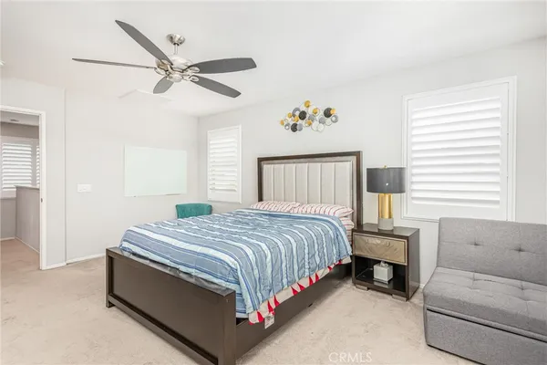a bathroom with a sink vanity and a mirror