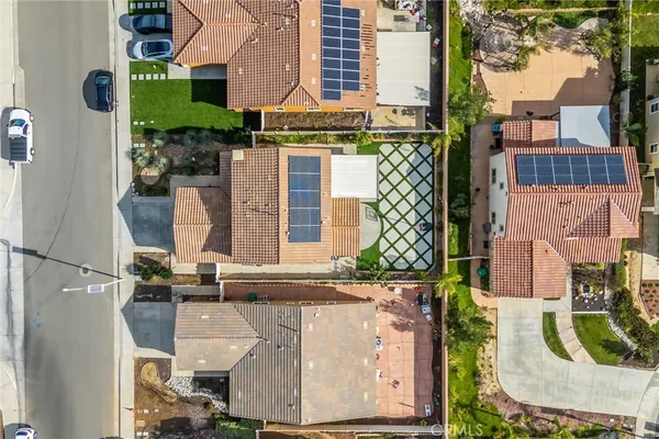 an aerial view of residential building with parking space