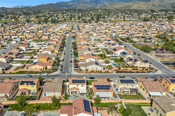 an aerial view of residential house and green space
