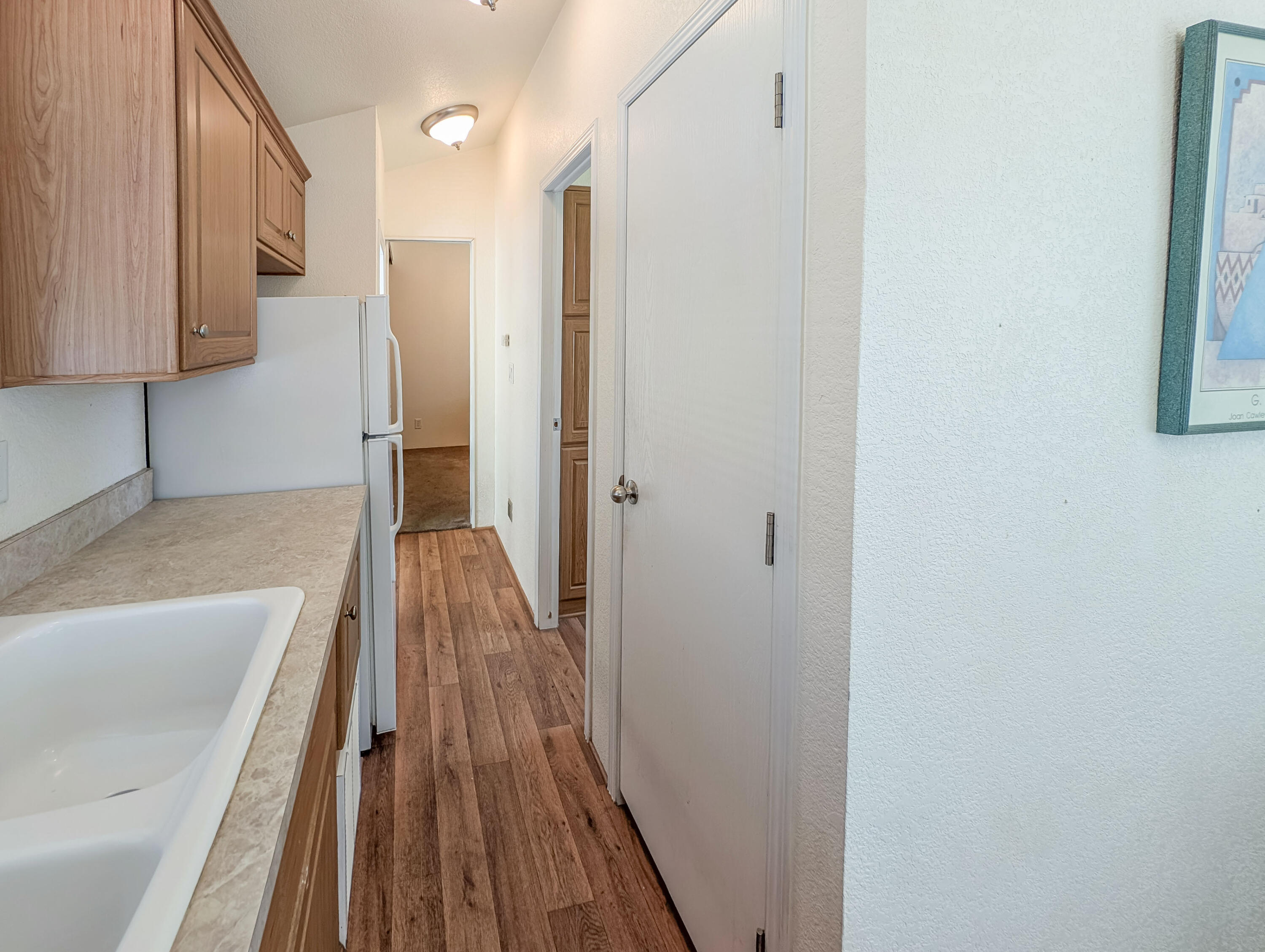 70200 Dillon Road, Unit 169 Desert Hot Springs, CA 92241 - Photo 11 of 25 a view of a bathroom with a tub and mirror