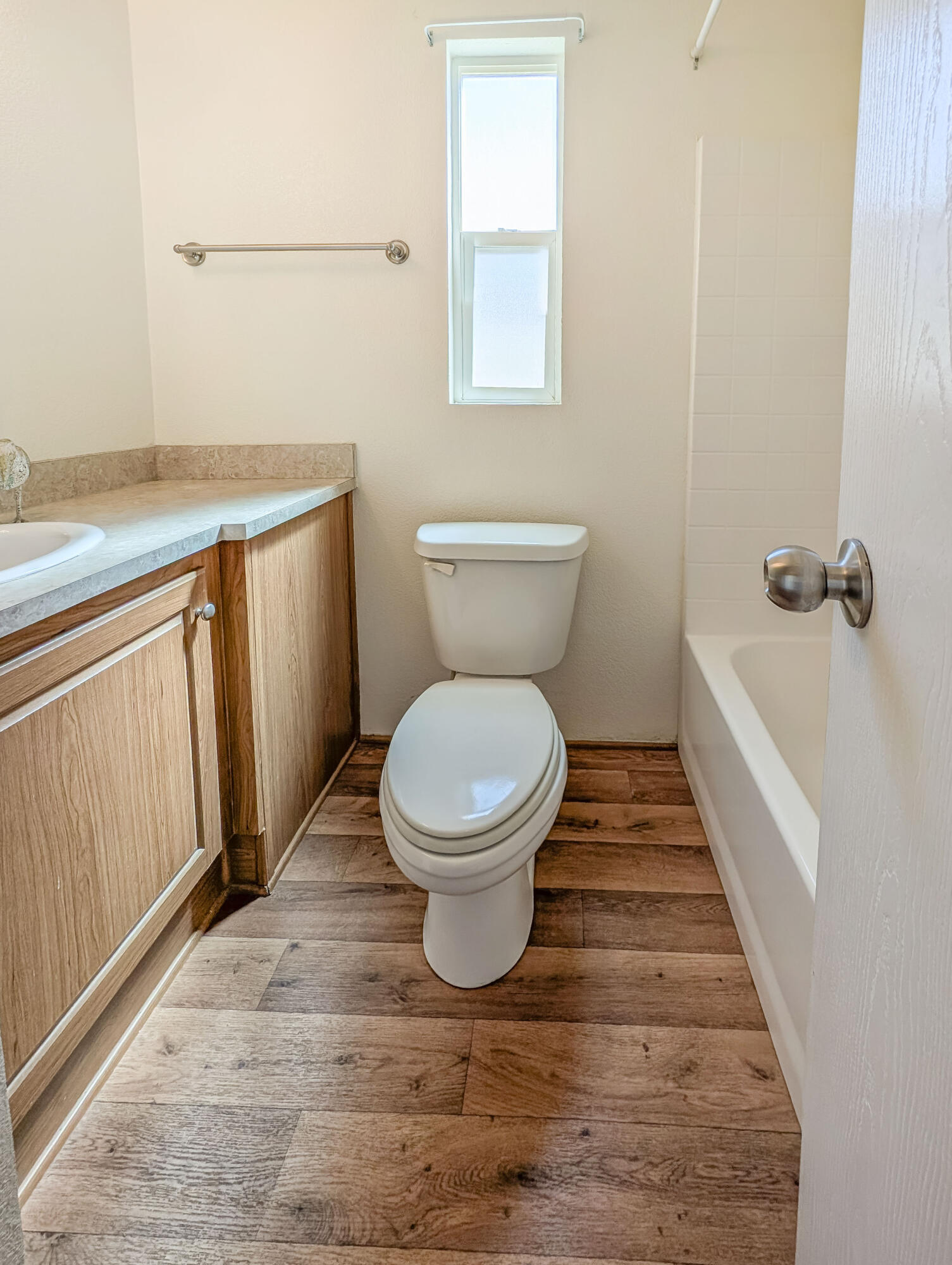 70200 Dillon Road, Unit 169 Desert Hot Springs, CA 92241 - Photo 12 of 25 a bathroom with a toilet and a sink