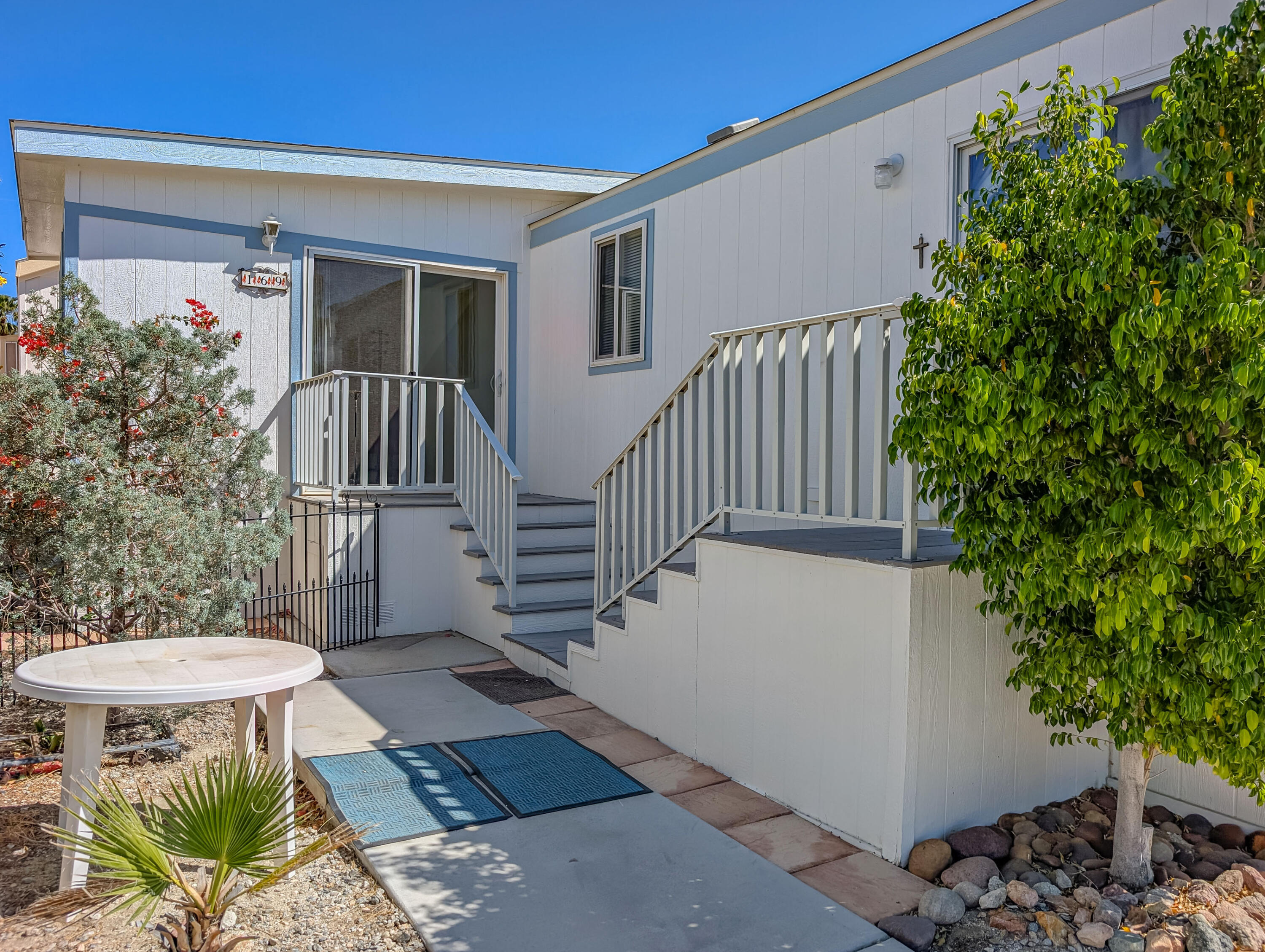 70200 Dillon Road, Unit 169 Desert Hot Springs, CA 92241 - Photo 3 of 25 a view of a porch with seating space