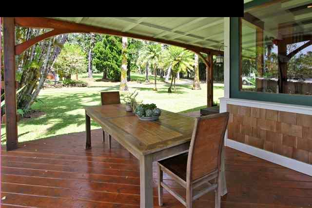 580 Awalau Road Haiku, HI 96708 - Photo 5 of 16 a view of an outdoor dining space with a table and chairs