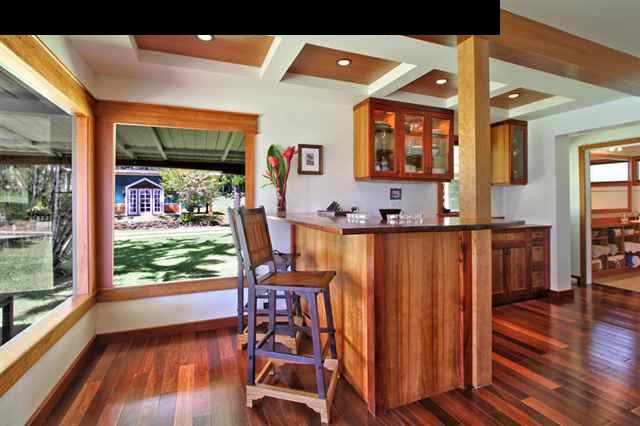 580 Awalau Road Haiku, HI 96708 - Photo 7 of 16 a living room with table chairs and a large window
