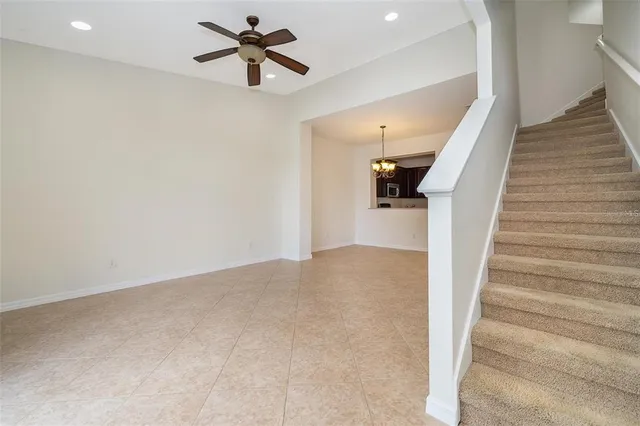 a view of a hallway with stairs