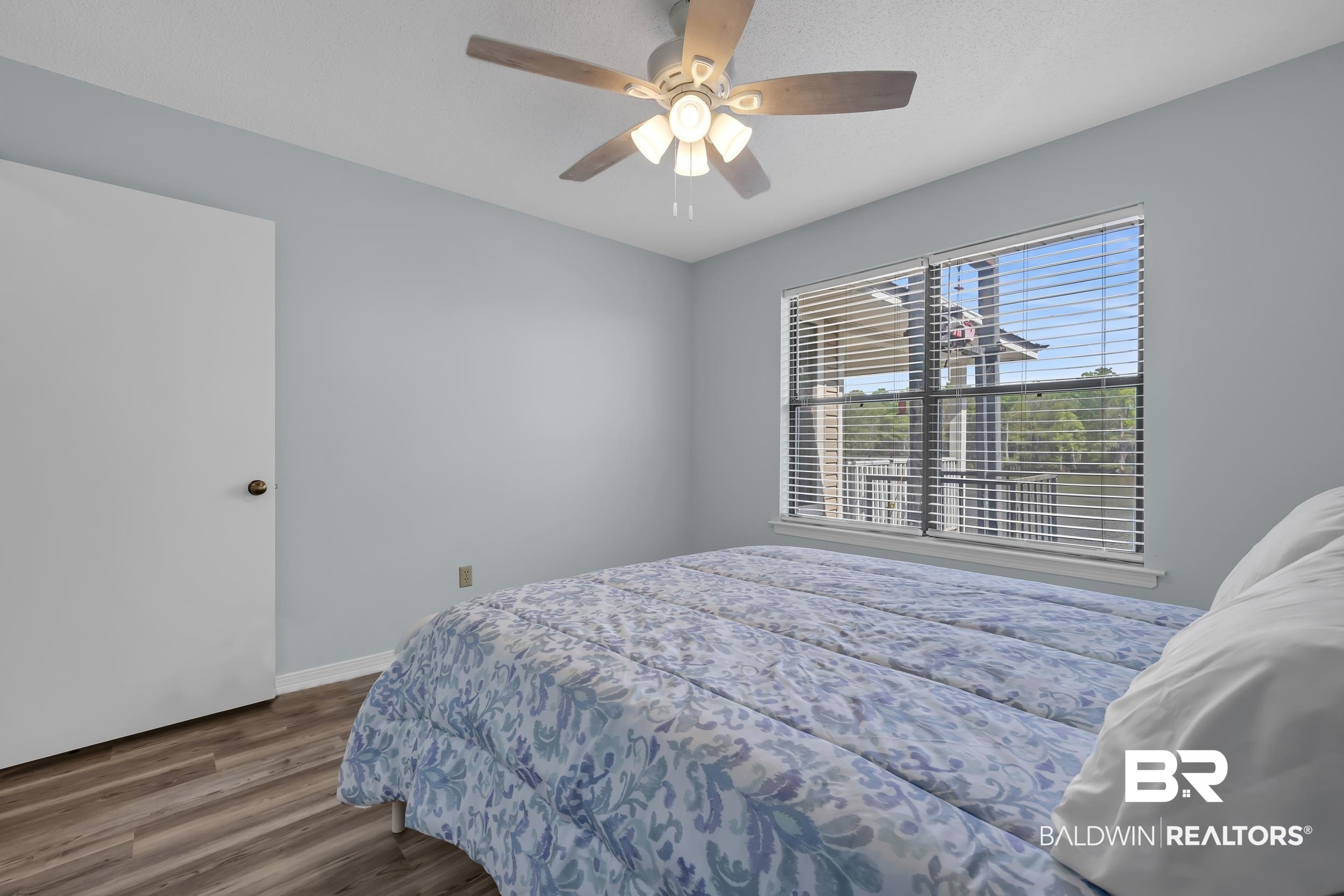8081 Bryant's Lndg Road Stockton, AL 36579 - Photo 34 of 48 Bedroom featuring dark wood-style floors and ceiling fan