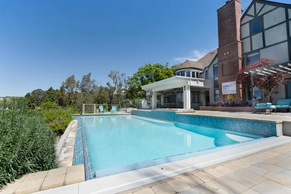 a view of a building with a swimming pool