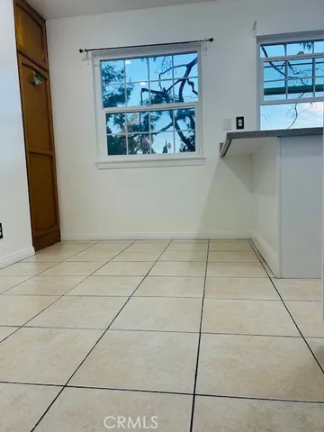 a view of a utility room with window