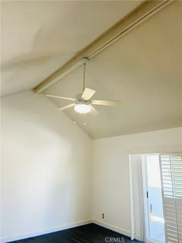 a white toilet sitting next to a shower