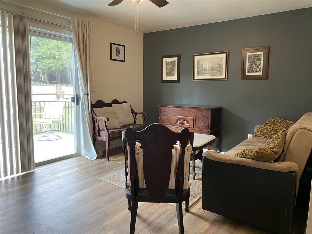 1500 Lake Shore Drive, Unit 213 Waco, TX 76708 - Photo 3 of 21 a living room with furniture and a window