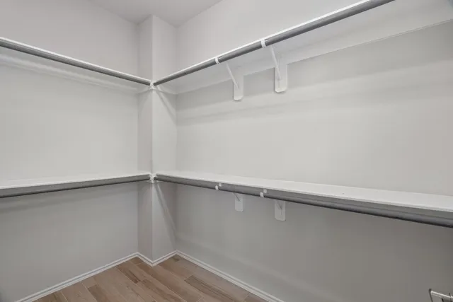 a view of an empty walk in closet