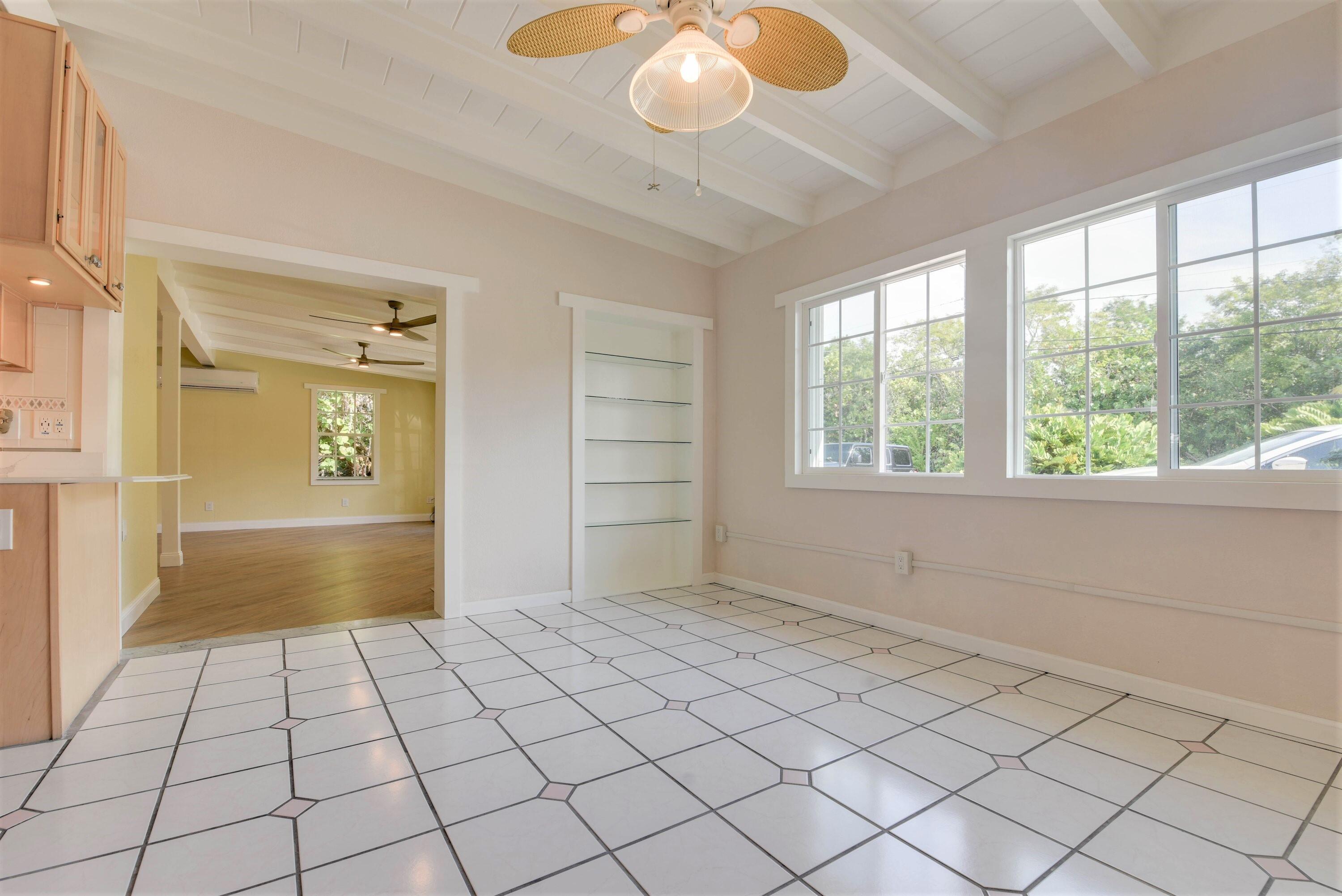 3828 Gillott Road Big Pine Key, FL 33043 - Photo 13 of 46 Dining Room With Built In Shelving