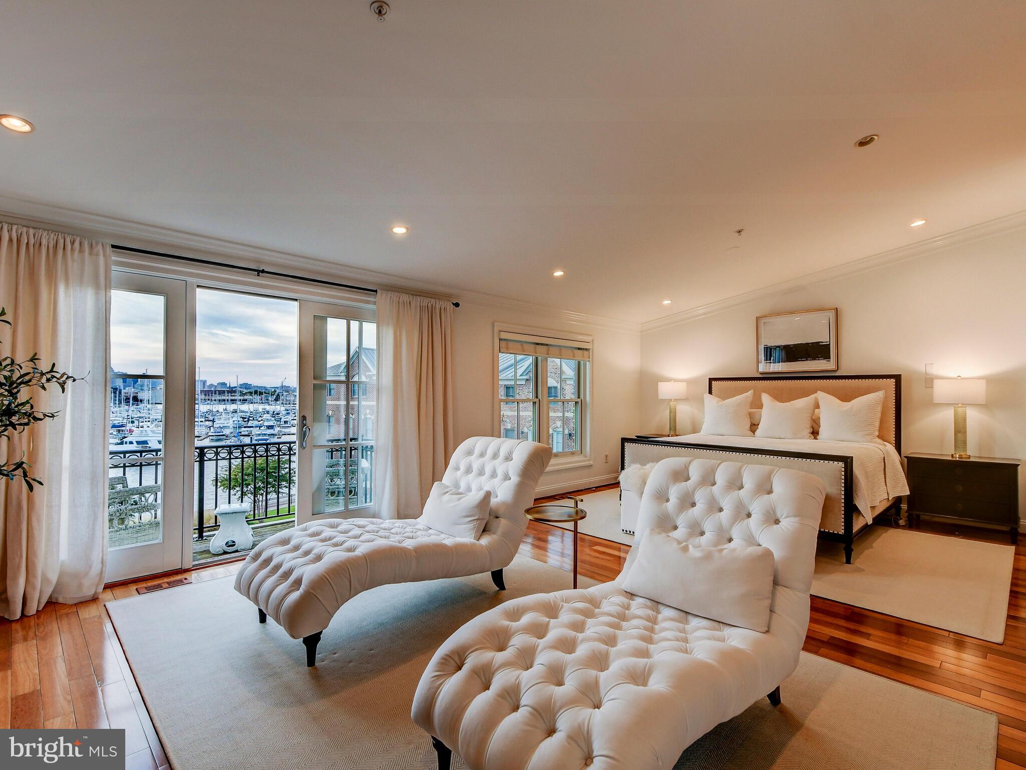 1230 Dockside Circle Baltimore, MD 21224 - Photo 33 of 70 a bed room with bed and a large window