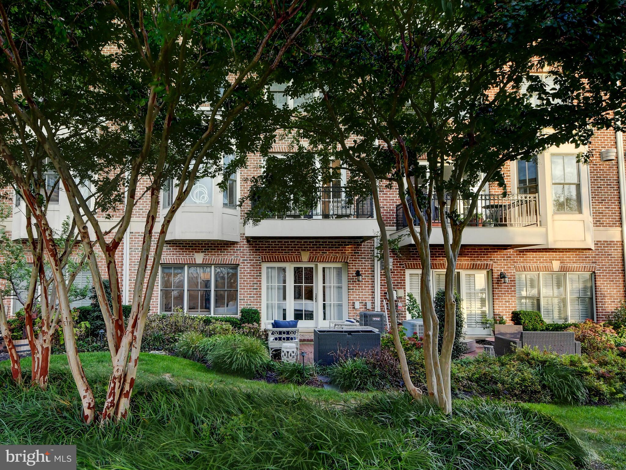 1230 Dockside Circle Baltimore, MD 21224 - Photo 46 of 70 a front view of a house with a yard