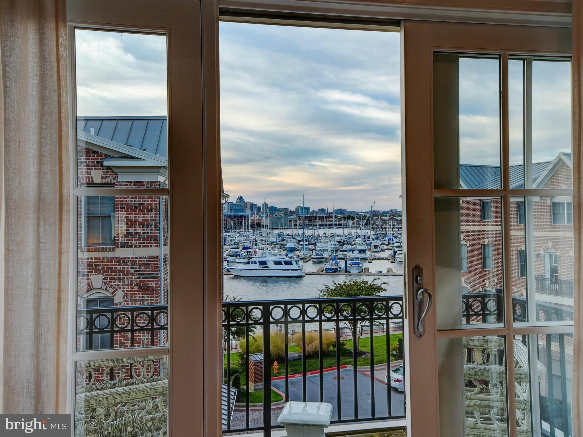 1230 Dockside Circle Baltimore, MD 21224 - Photo 60 of 70 a view of a glass building from a window