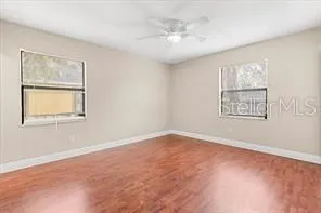 a view of an empty room with a window