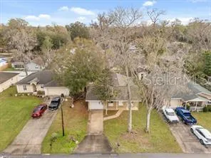 a view of backyard with trees