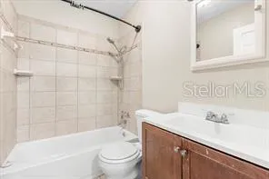 a bathroom with a sink a toilet and a bathtub