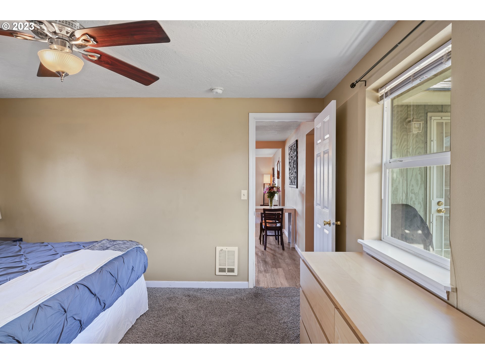 760 28th Street Springfield, OR 97477 - Photo 16 of 30 a living room with furniture and a window