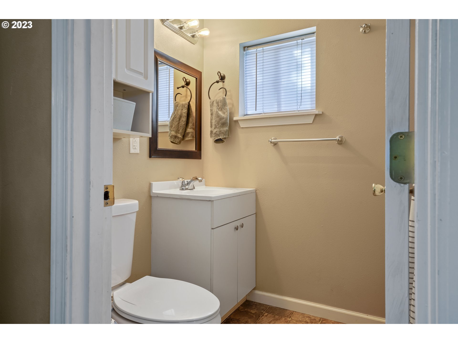 760 28th Street Springfield, OR 97477 - Photo 17 of 30 a bathroom with a toilet sink and mirror