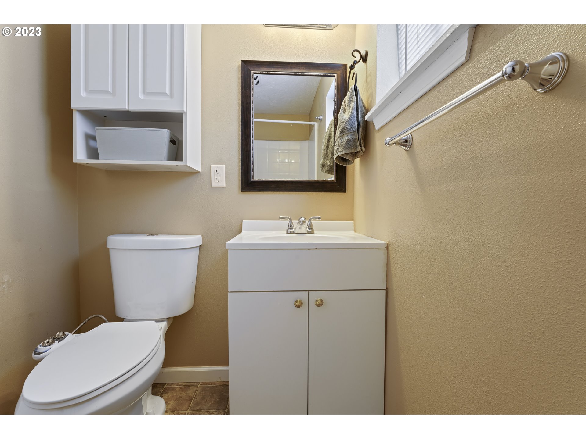 760 28th Street Springfield, OR 97477 - Photo 18 of 30 a bathroom with a sink a toilet and mirror